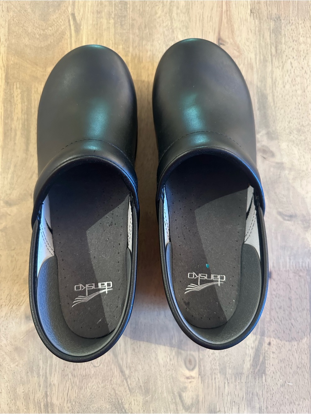 Dansko Black Leather Slip-On Clogs